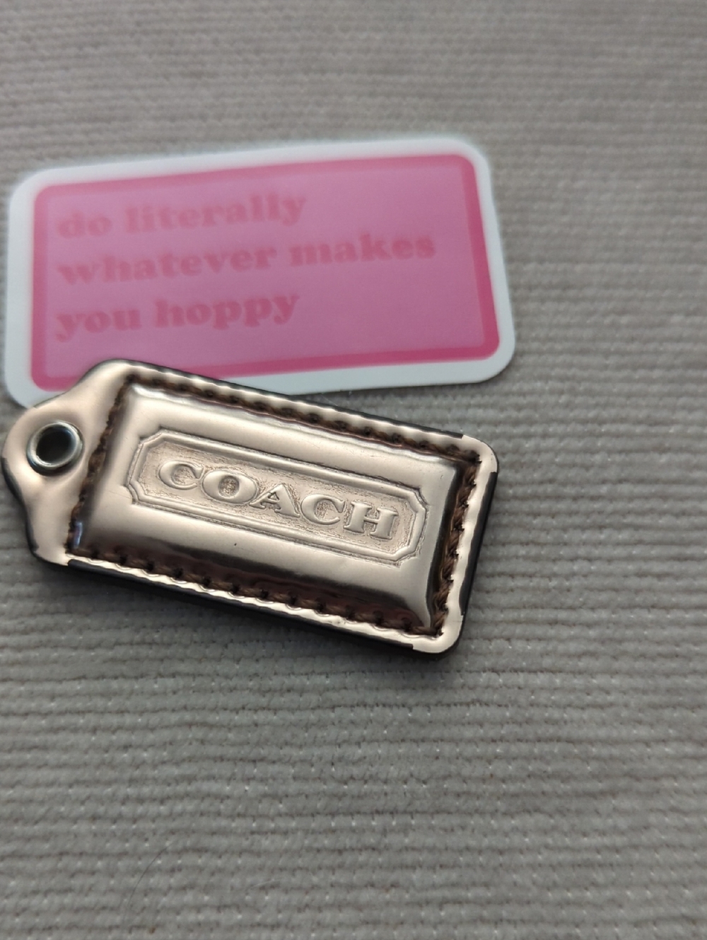 Coach 1.75" Metallic Rose Gold Leather Hang Tag